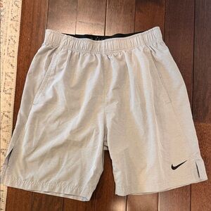 Nike sz M Light Gray Athletic Shorts with Black Swoosh